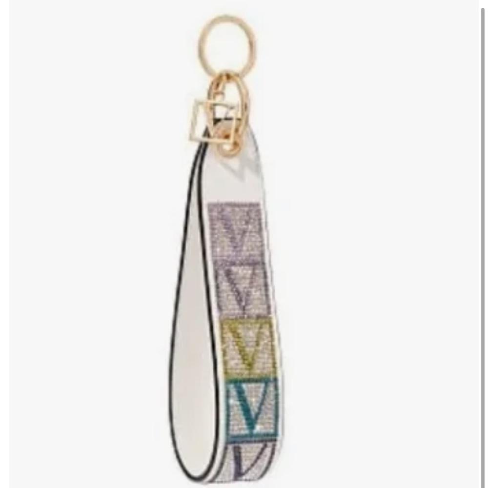VICTORIA'S SECRET WHITE SHINE
V-MONOGRAM WRISTLET STRAP
KEYCHAIN - Picture 2 of 4